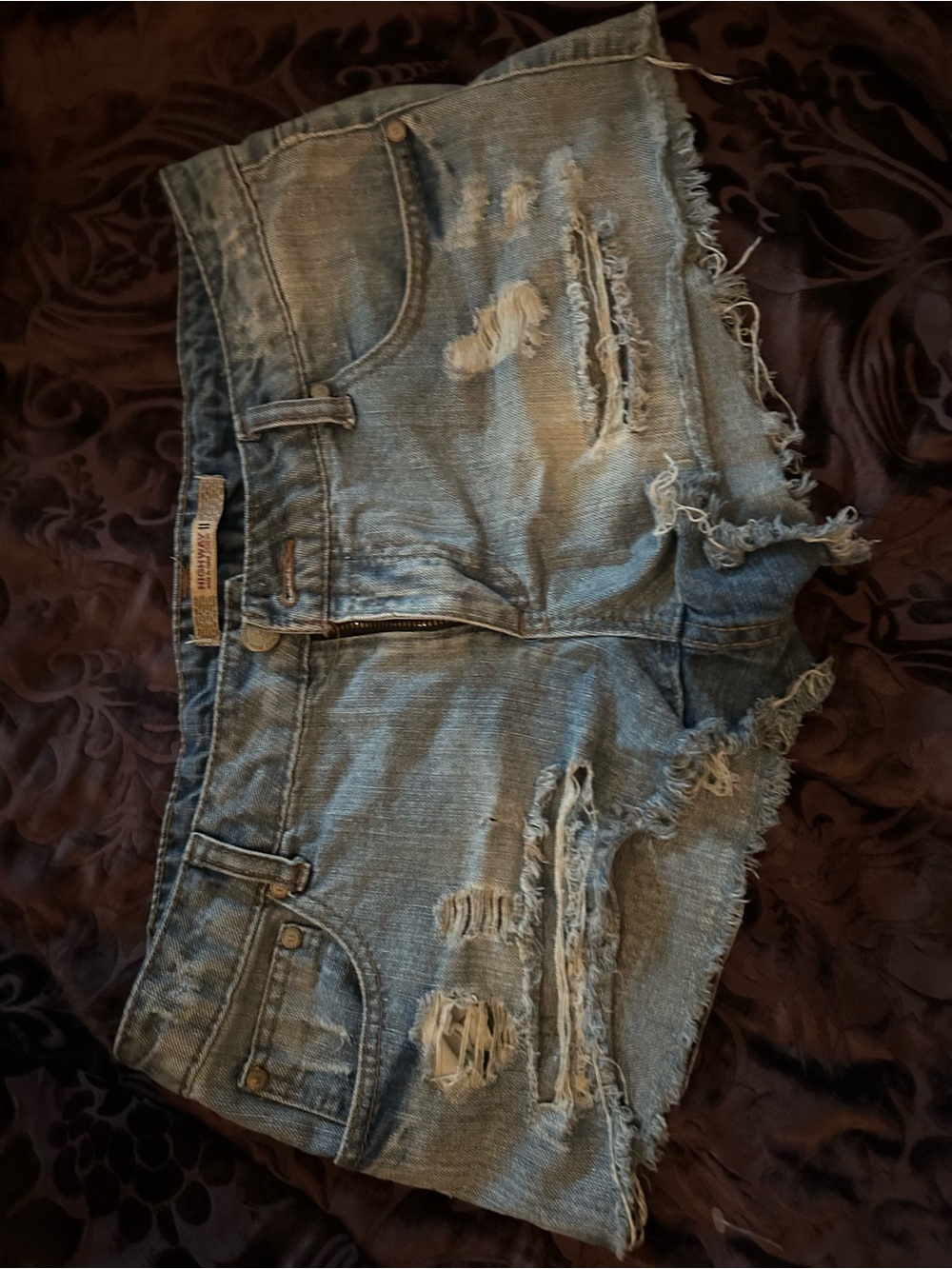 Women's Distressed Light Blue Denim Shorts